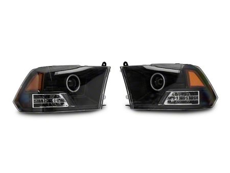 Raxiom Projector Headlights Dodge Ram 1500 Factory Halogen (09-18) Black Housing  Clear Lens Discount